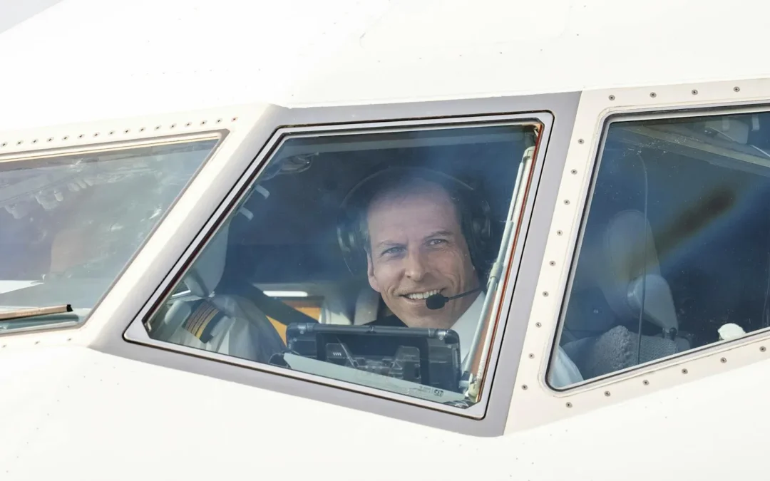 Professional airline pilot in a commercial aircraft cockpit
