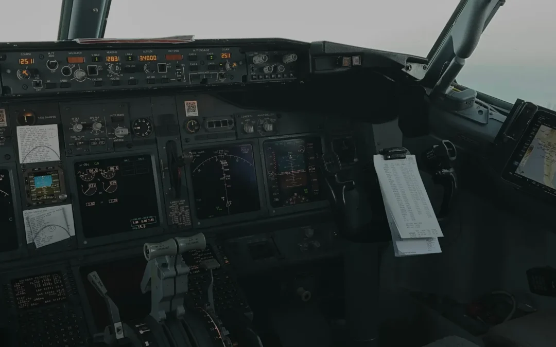 Boeing 737 cockpit interior with control panels and instruments in a commercial airliner flight deck